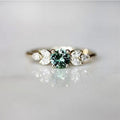 Ring Gold grüner Zirkonia mit Flügeln