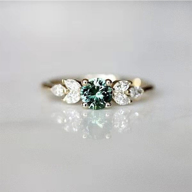 Ring Gold grüner Zirkonia mit Flügeln
