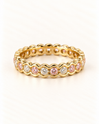 Eternity Ring mit pinken und weißen Zirkonia Steinen in Gold
